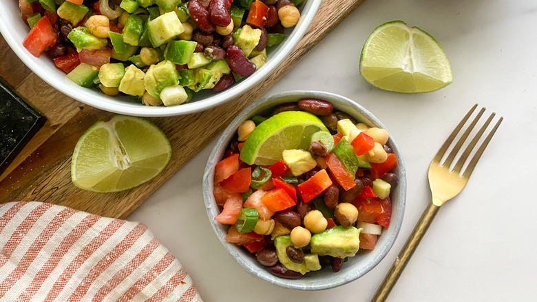 bean salad with lime wedges