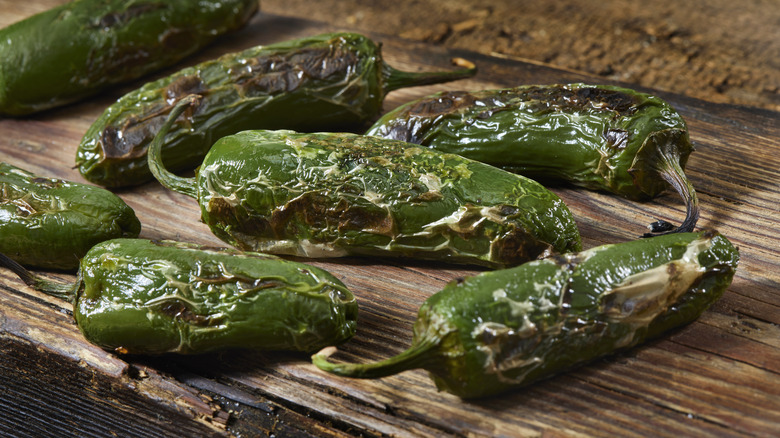 Roasted jalapeños on table 