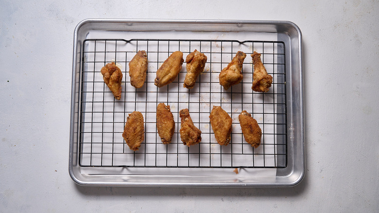 fried chicken wings on wire rack