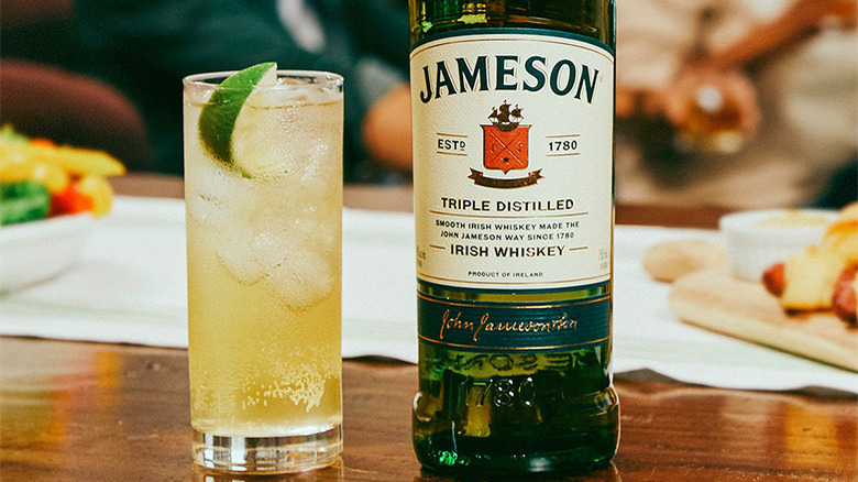 Jameson bottle and highball cocktail 