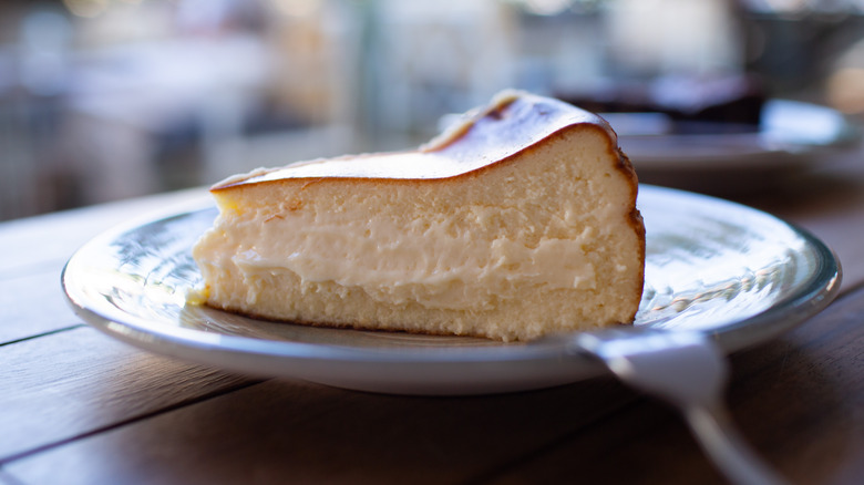 Close-up of a slice of Basque cheesecake