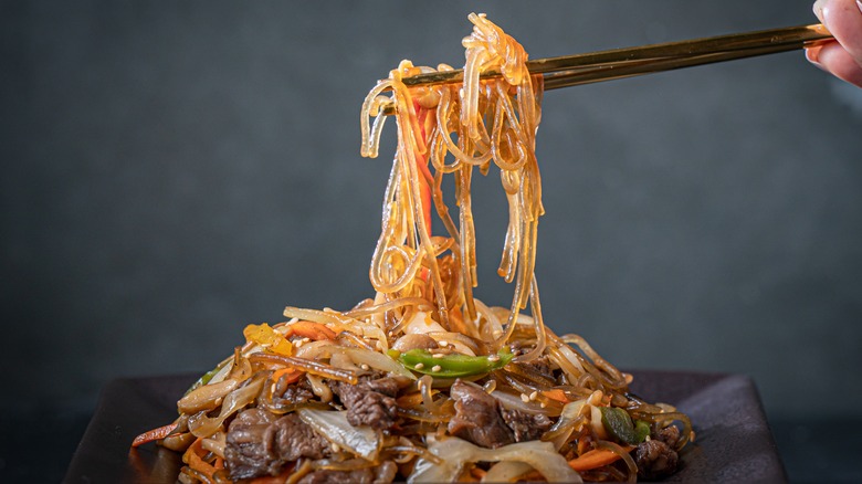 Chopsticks used to lift japchae