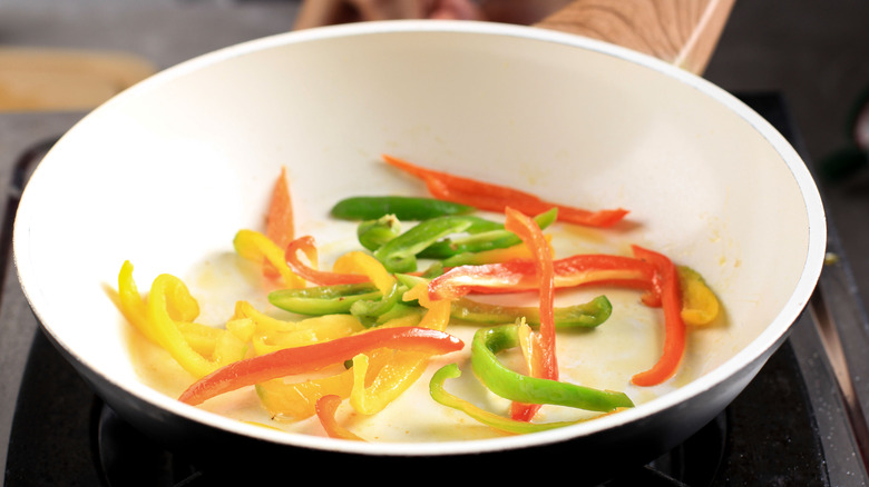 Stir-frying peppers for japchae