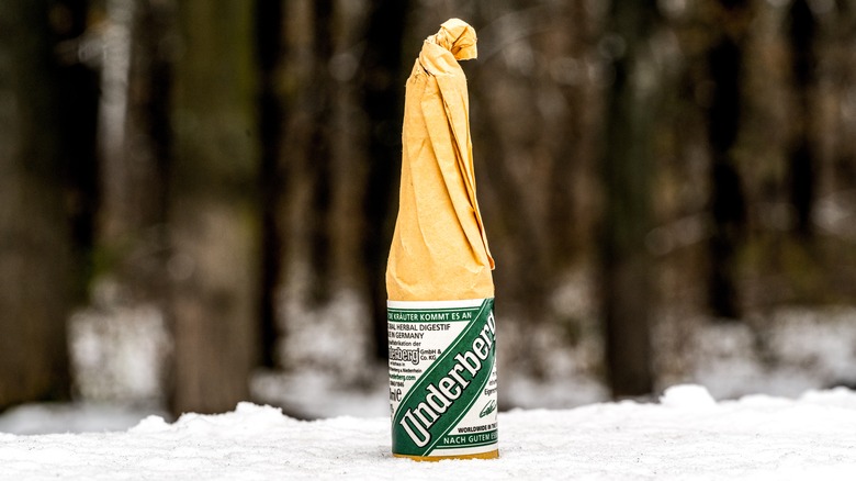 Underberg bottle in snow