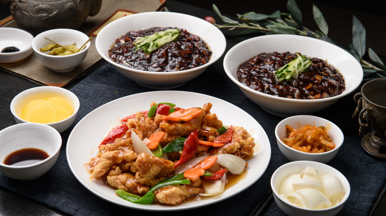 Jjajangmyeon on table with tangsuyuk