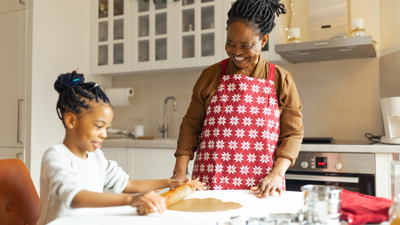 Mother and daughter make cookies