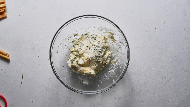 cheese ball ingredients mixed together in bowl