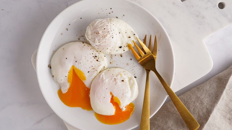 Poached eggs on plate