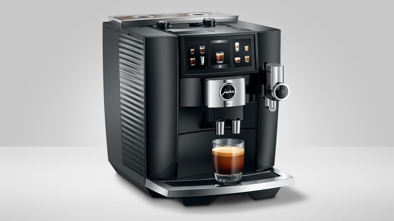 Jura J8 twin espresso machine brewing coffee