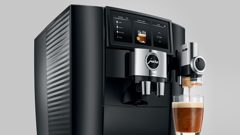 Jura J8 twin espresso machine brewing coffee