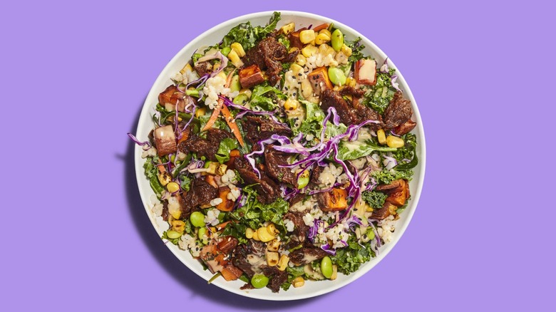 Top-down view of a Just Salad BBQ Shroom Bowl