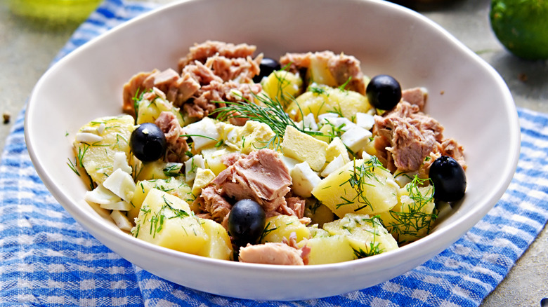 bowl of potato salad with olives