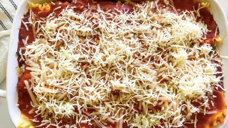 uncooked lasagna in dish