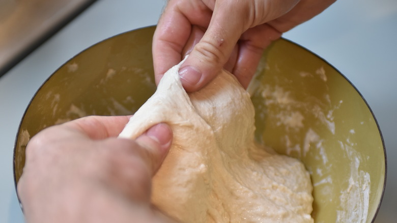 stretching sourdough bread