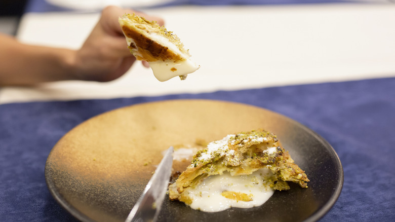 woman eating katmer