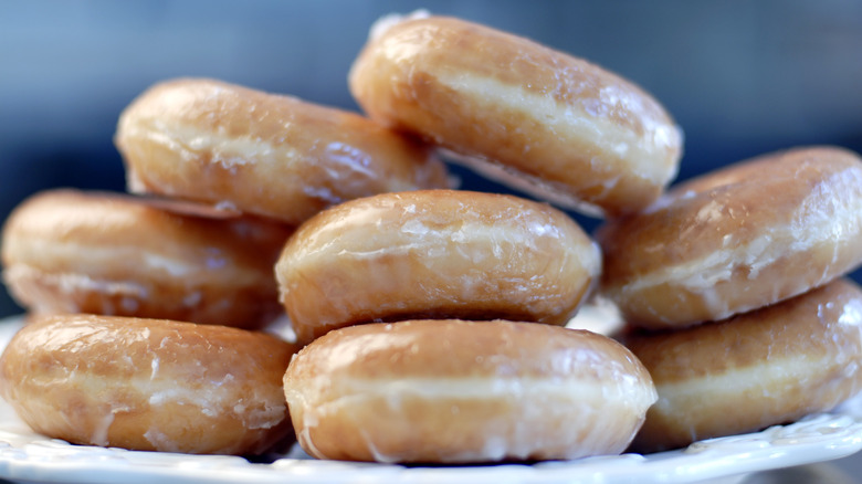 plate of glazed donuts