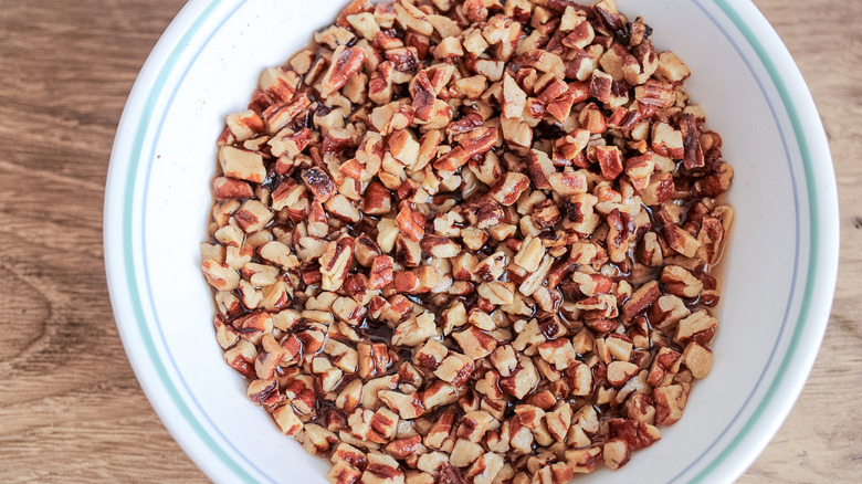 chopped nuts soaking in liquid