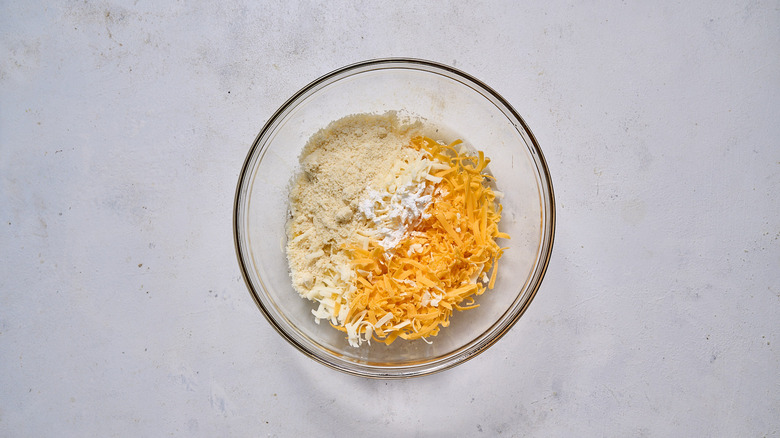 cheeses and flour in bowl