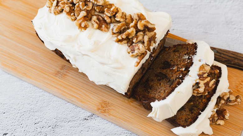 Sliced carrot cake on board