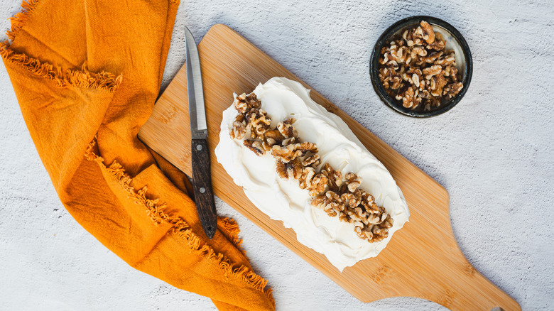 Carrot cake with walnuts and napkin