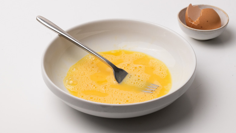 Whisked egg in a bowl