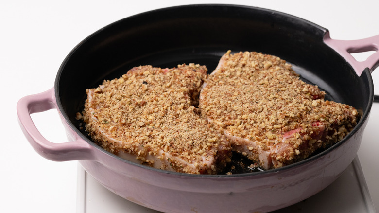 frying pecan-crusted pork chops