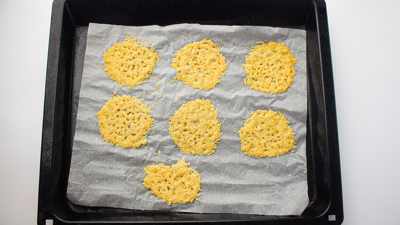 parmesan crisps on baking sheet