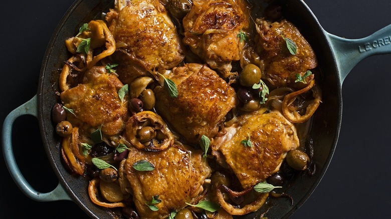 skillet of braised chicken thighs