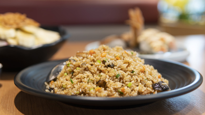 fried rice on black plate