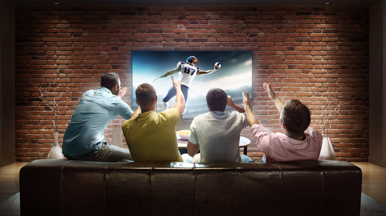 A group watching football on TV