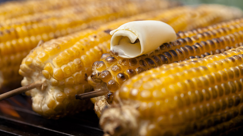 Butter melting on top of corn cobs