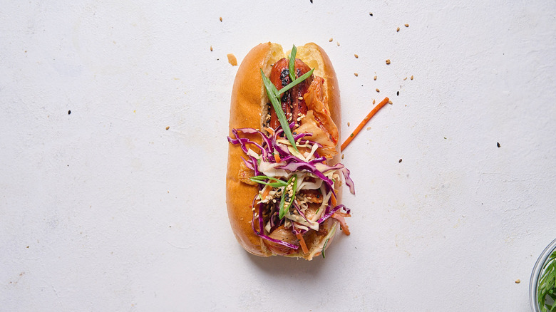 hot dog topped with scallions