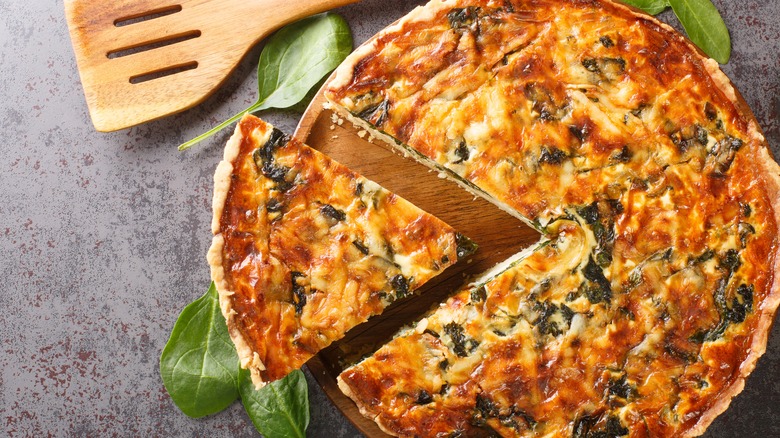 Spinach quiche on table