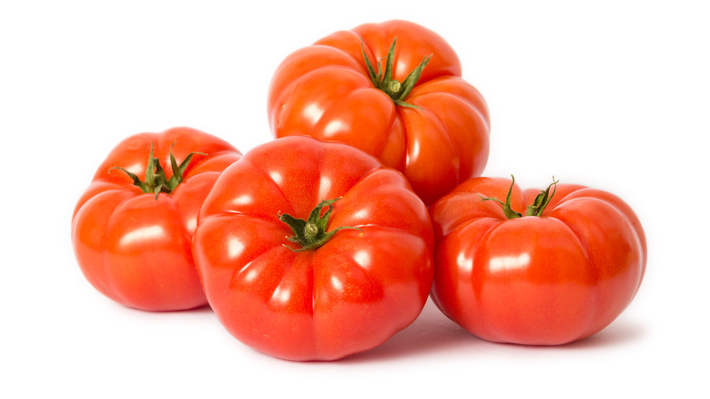 Beefsteak tomatoes isolated on white background