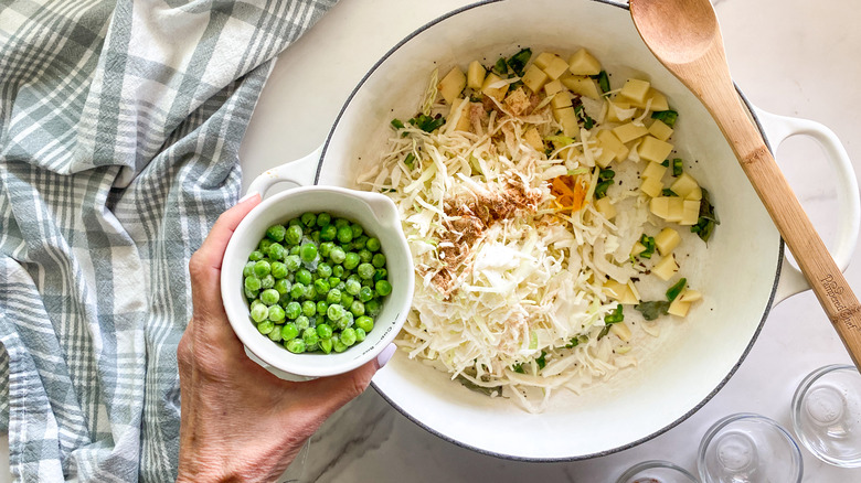 adding peas to pot