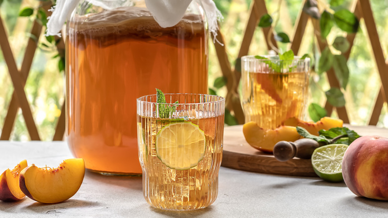 Jar of kombucha with peaches