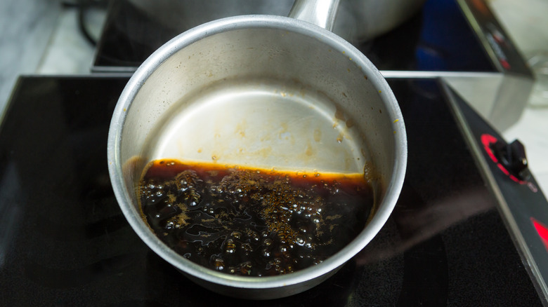 boiling pot of coffee on stove 