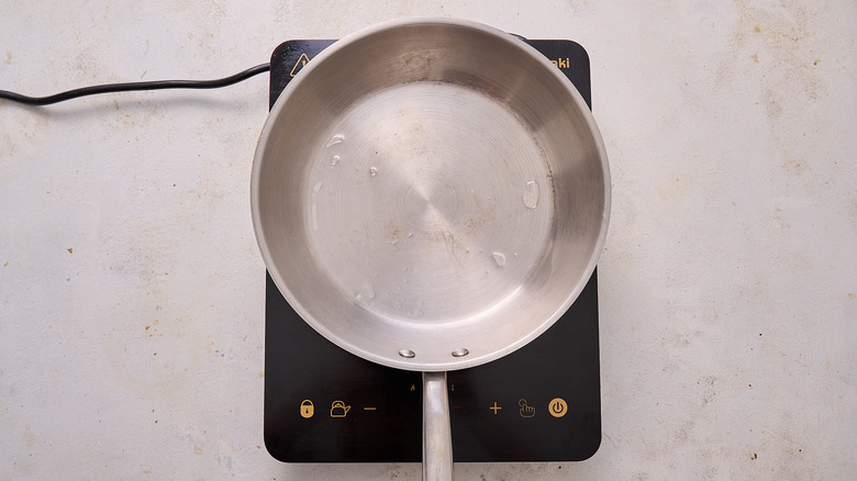 heating oil in a skillet