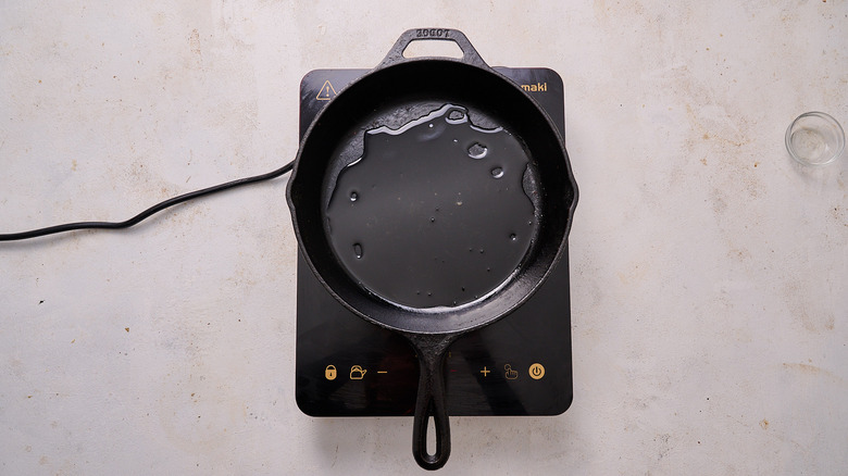 heating oil in skillet