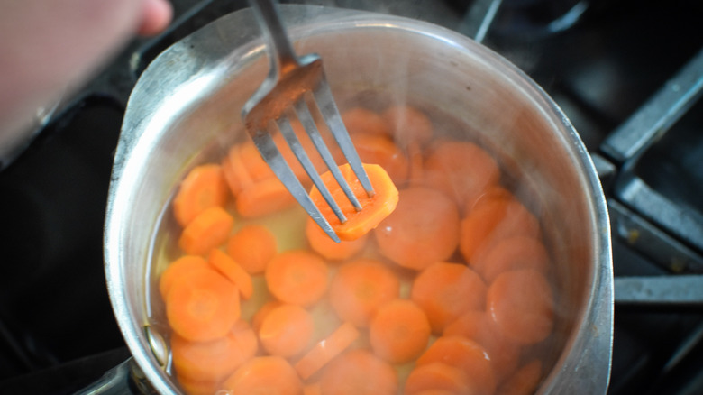 Carrots cooking in a pot