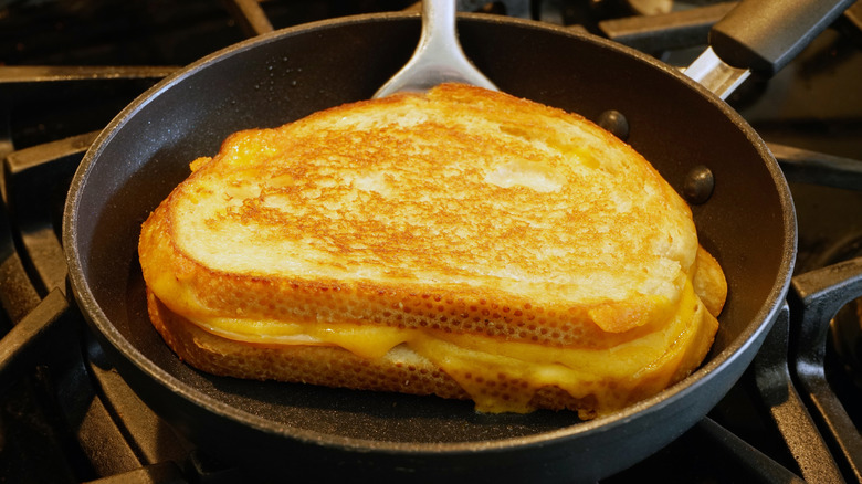 Grilled cheese sandwich in pan