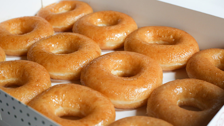 A dozen Krispy Kreme glazed doughnuts 