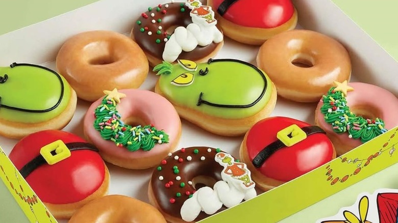 A box of Krispy Kreme's Grinch-themed holiday donuts