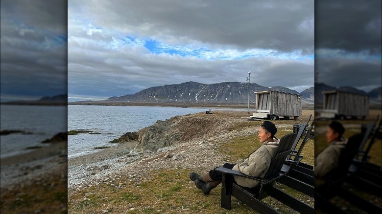 Kristen Kish sits in nature