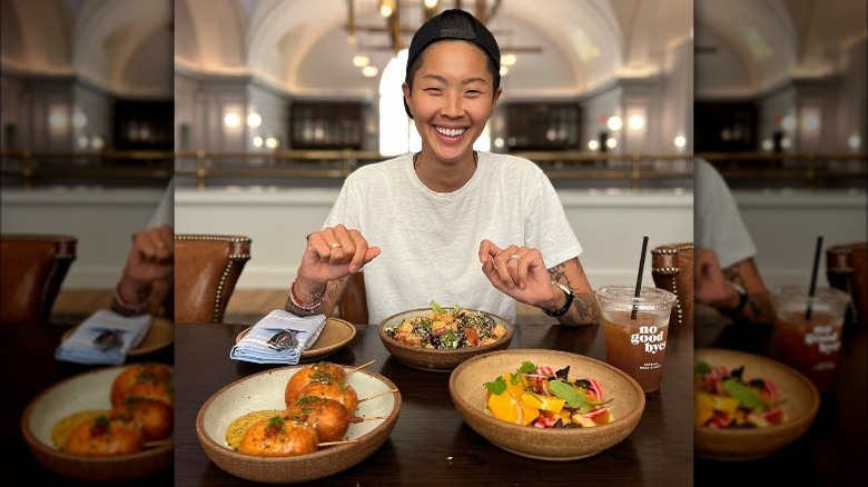 Kristen Kish smiling at table