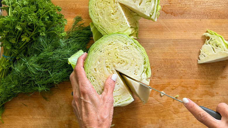 hand cutting core from cabbage