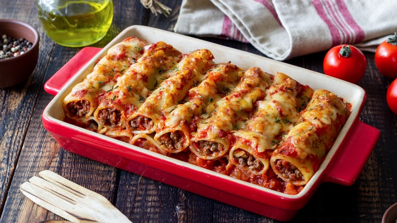Cheesy cannelloni in baking dish