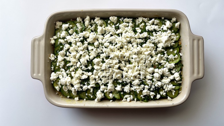 crumbled feta topping in a baking dish