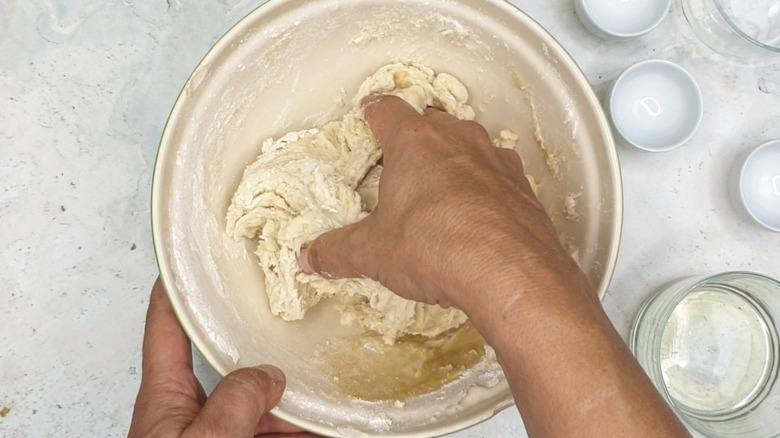 Mixing dough in a bowl