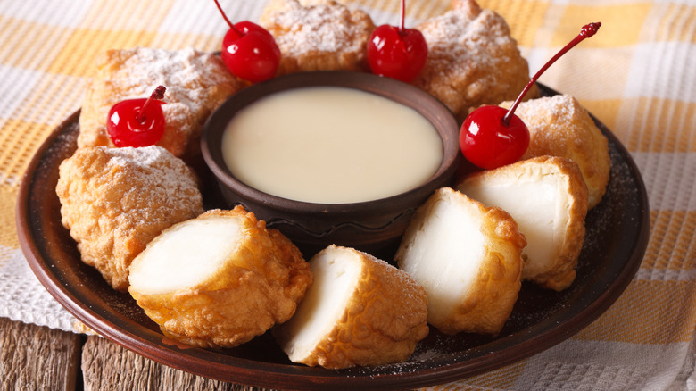 Leche frita with condensed milk and cherries